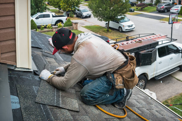 Professional Roofing technician working in Cambridge City, IN
